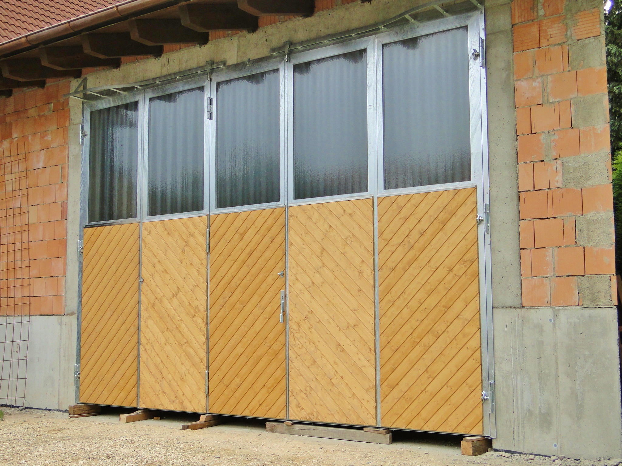 Falttore / Mehrflügeltore - ALLEMANN® GmbH Holz- u. Metallprodukte